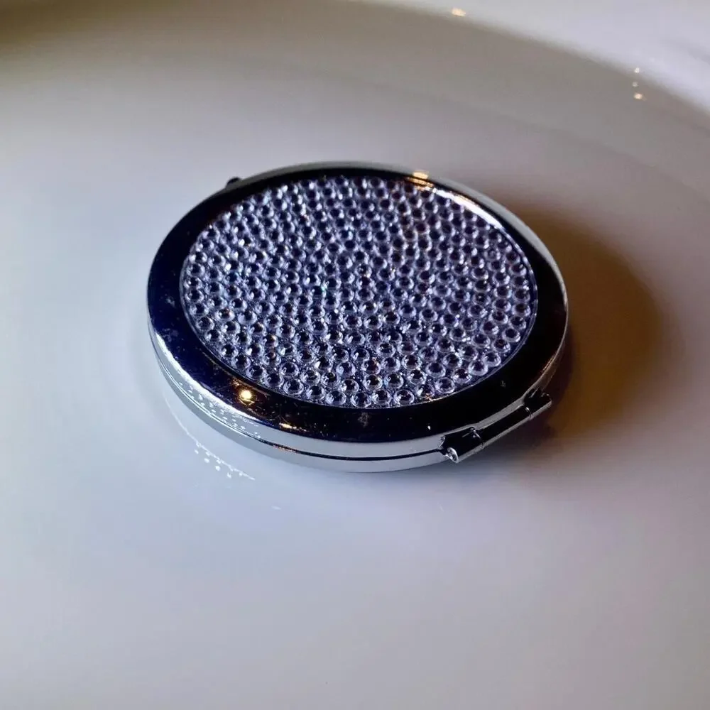 Magnifying compact mirror brand new